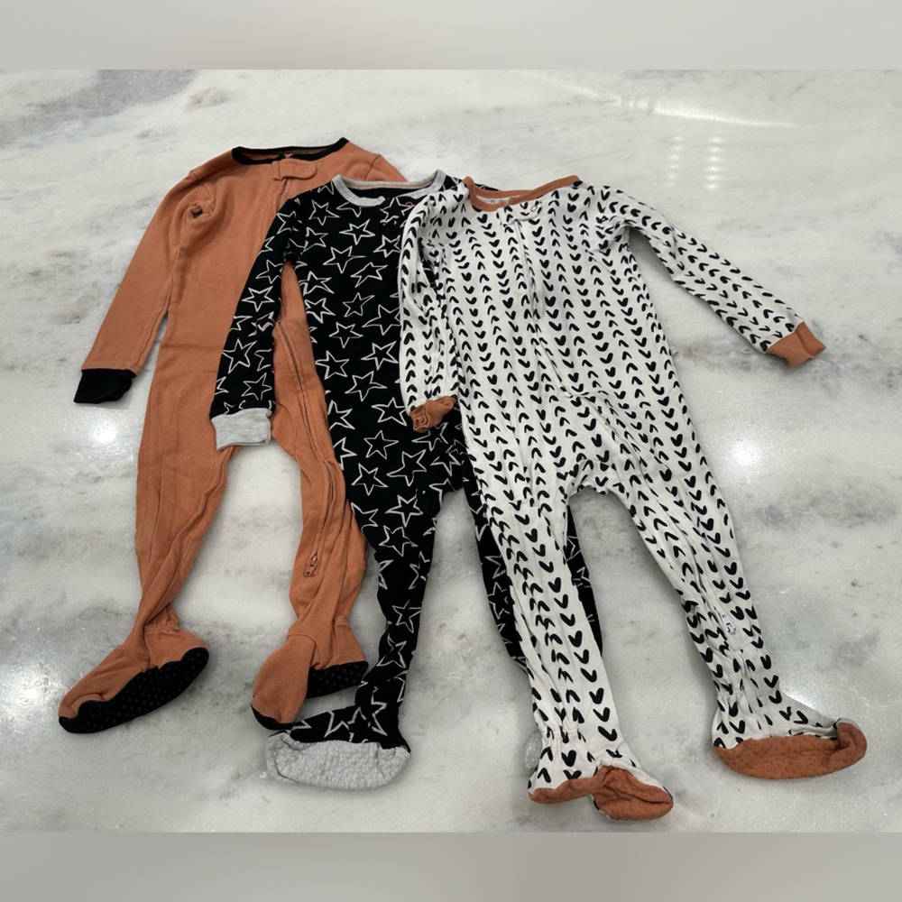 New without tags. Bundle of three zip up footed pajamas. Size 18 months.